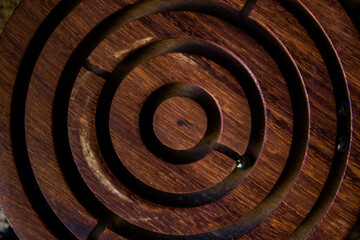 Close up of the circular wooden game