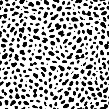 Seamless animal pattern. Imitation of skin of dalmatian dog. Black spots on white background.