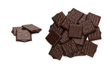 Dark chocolate candies isolated on white background.