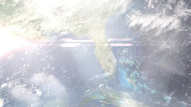 Earth zoom in from outer space to city. Zooming on St. Petersburg, Florida, USA. The animation continues by zoom out through clouds and atmosphere into space. Images from NASA