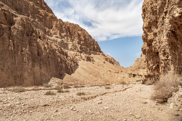 Fototapeta premium Mountains of stone desert near the Tamarim stream on the Israeli side of the Dead Sea near Jerusalem in Israel