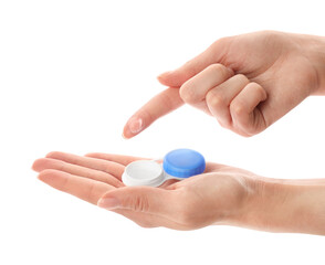 Woman holding case with contact lenses on white background, closeup