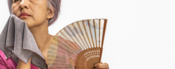 Middle aged woman feel hot flashes or overheated , symptoms of menopause