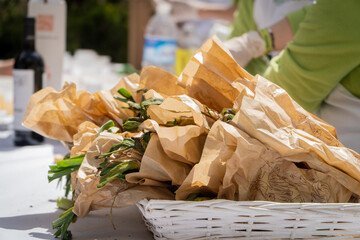 paper bags with garlic bunches the market of the roasted garlic festival in  Arnedo, La Rioja, Spain