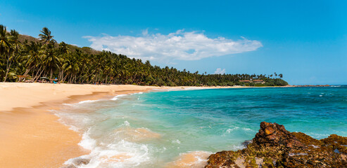Tropical beautiful landscape, turquoise ocean and bright sand beach, paradise vacation on island.