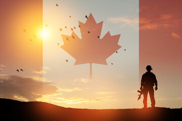 Canada army soldier on a background of sunset or sunrise and Canada flag. Greeting card for Poppy...