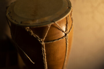 Fototapeta na wymiar Wooden drum. African percussion instrument. Traditional musical instrument.