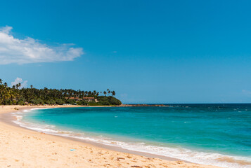 Fototapeta na wymiar Tropical landscape, paradise beach against the blue ocean, perfect vacation in silence.