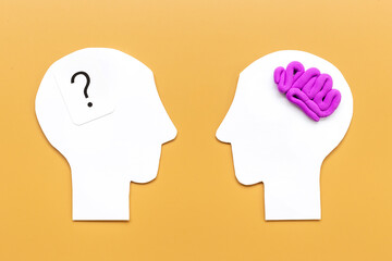 Contact between peolpe and communication. Brain on two paper human heads