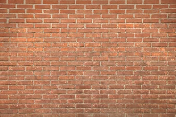 Photo sur Plexiglas Mur de briques La texture du mur de briques rouges en arrière-plan