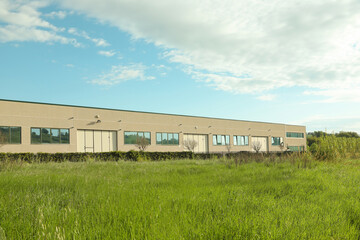 Exterior of factory building on sunny day