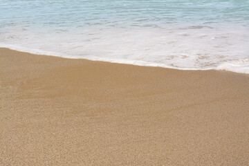 Fototapeta na wymiar Beautiful view of sandy beach and sea. Summer vacation