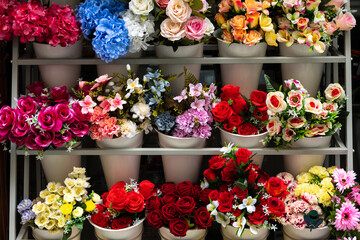 Fototapeta na wymiar display with vases full of flowers