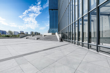 Empty square floor and city skyline with modern commercial buildings in Shanghai, China.