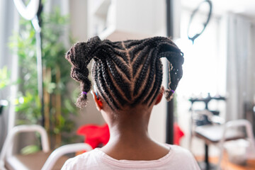 Close-up of girl's braided hair © Cultura Creative