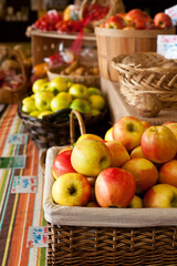 Local Farmers Market Coop Grocery Store Display of Apples with Colorful Fresh Organic Fruit and Vegetables Produce in Woven Baskets