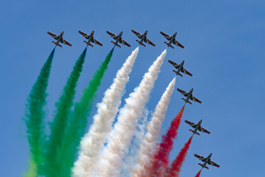 RAF Fairford, Gloucestershire, UK - July 12, 2014: Frecce Tricolori formation display team of the Italian Air Force (Aeronautica Militare Italiana) flying Aermacchi MB-339PAN aircraft.