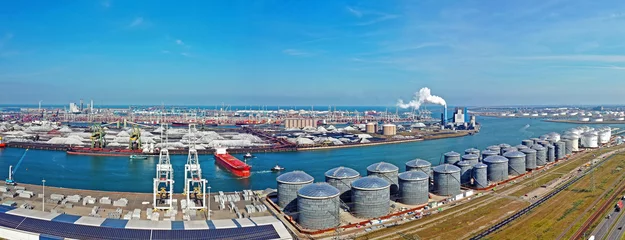 Foto op Plexiglas Aerial panorama from industry in the harbor from Rotterdam in the Netherlands © Nataraj