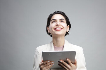 Young businesswoman using tablet