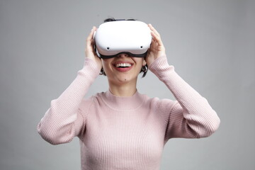 Young woman using virtual reality headset