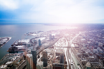 Toronto city downtown and Ontario lake at winter aerial view
