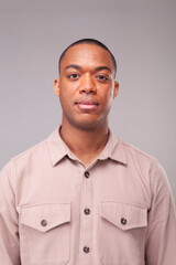 Portrait of man in beige shirt
