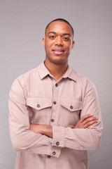 Portrait of smiling man in beige shirt