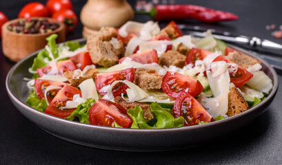 Delicious spring fresh vegetable salad with cherry tomatoes, cucumber, breadcrumbs and parmesan cheese