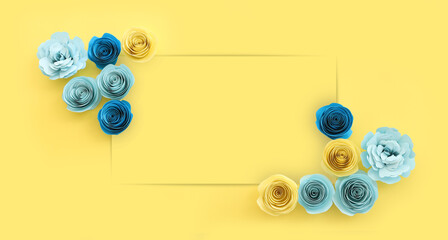 Fototapeta premium Top view image of paper flowers composition over yellow background