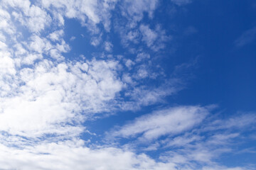 Naklejka na ściany i meble Blue sky with white clouds on a daytime