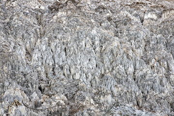 The texture of a salt rock eroded by rain