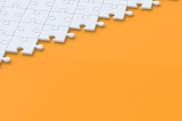 Unfinished blank jigsaw puzzle pieces on orange background. Copy space. 3d render