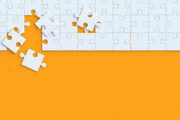 Unfinished white jigsaw puzzle pieces on orange background. Copy space. Top view. 3d render