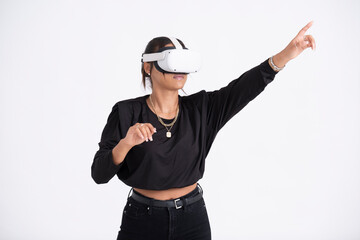 Studio shot of young woman wearing VR headset