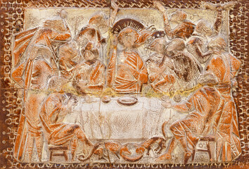 MONOPOLI, ITALY - MARCH 6, 2022: The ceramic relief of Last Supper on the mensa in church Chiesa di...