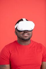 Studio shot of man wearing VR goggles