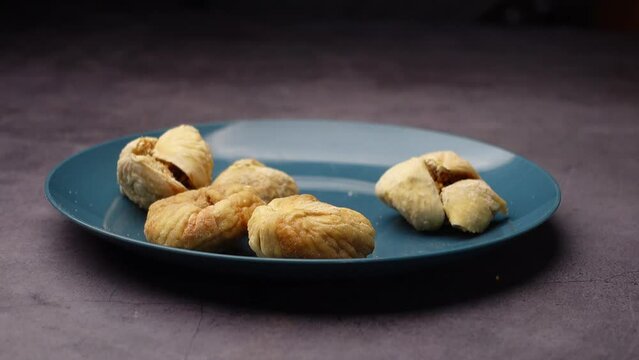 Dried fig fruit on on a plate on table 