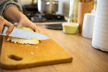 Fototapeta na wymiar chopping cabbage on cut board