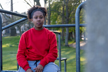 Portrait of teenage girl in park