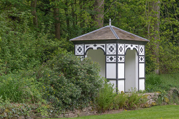 Black and white open garden shelter