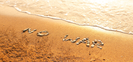 Words written in the sand on the beach. The words No War and written in the Sand with the Ocean in the background. Protest War sign written in sand. World Peace. No War