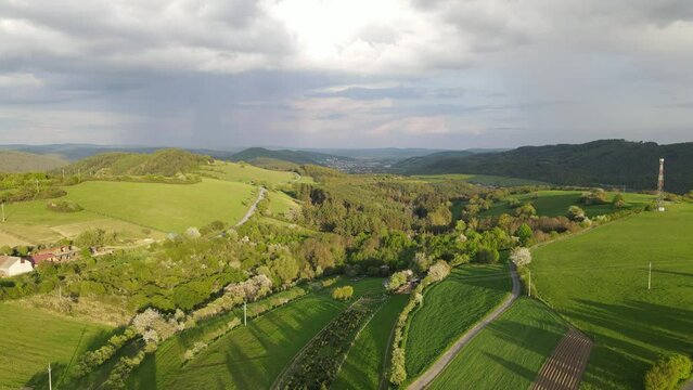 Spring nature meadow before storm in Czech republic. Nice meadow and field
