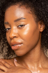 Close-up of woman with curly hair
