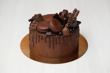 Chocolate cake with chocolate decoration, chocolate ganache