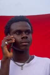 Portrait of young man talking on phone