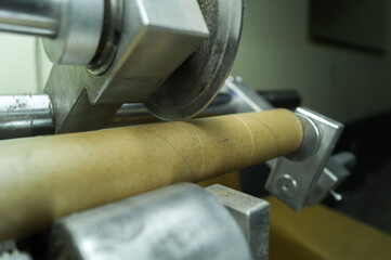 Machine for cutting cardboard bushing for printing house. Cutting cardboard reels and spools for...