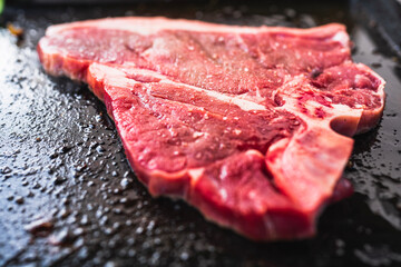 raw beef T bone steak 