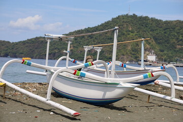 Obraz na płótnie Canvas Colorful sailboats on the bali marina pier. Travel concept with beautiful destinations in Bali, Indonesia