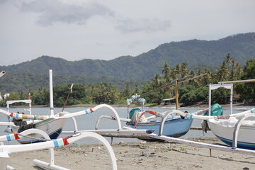 Colorful sailboats on the bali marina pier. Travel concept with beautiful destinations in Bali, Indonesia