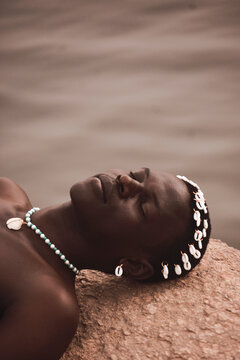 Man wearing traditional African jewelry